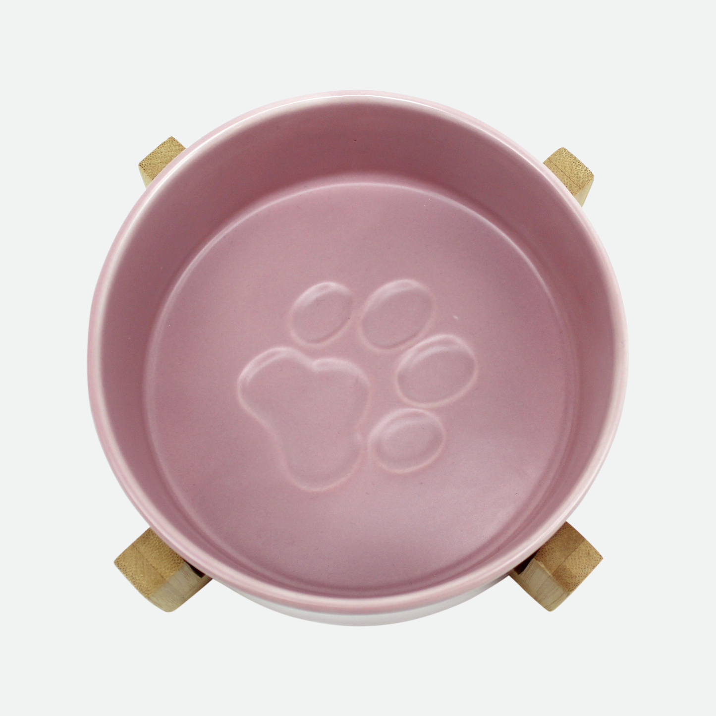 Ceramic bowl on wood pilotis for pet, pink