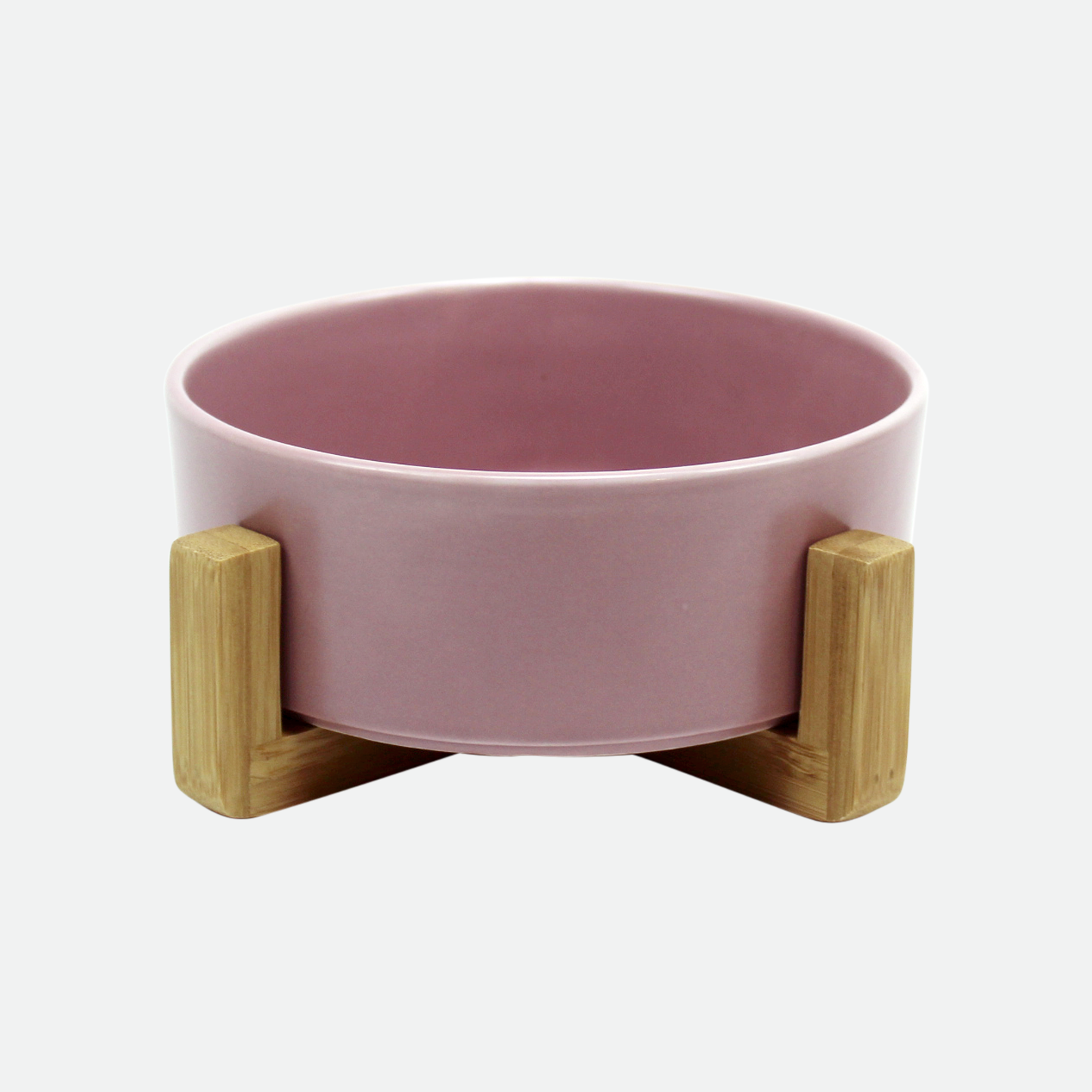 Ceramic bowl on wood pilotis for pet, pink